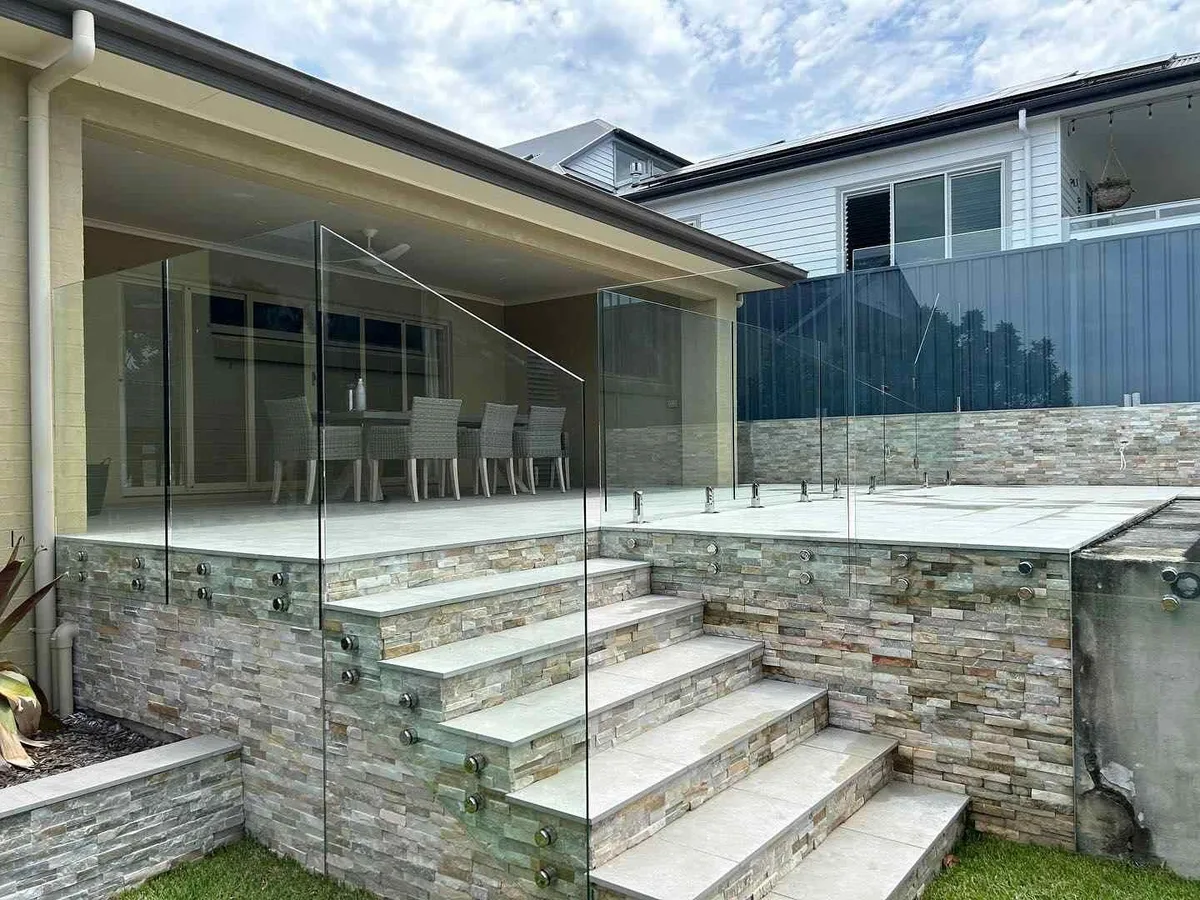 Glass balustrade fitted around a home's outdoor steps by Tuggerah Lakes Glass